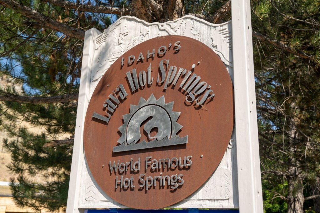 A sign indicating Lake Meadows Springs known for its renowned hot springs