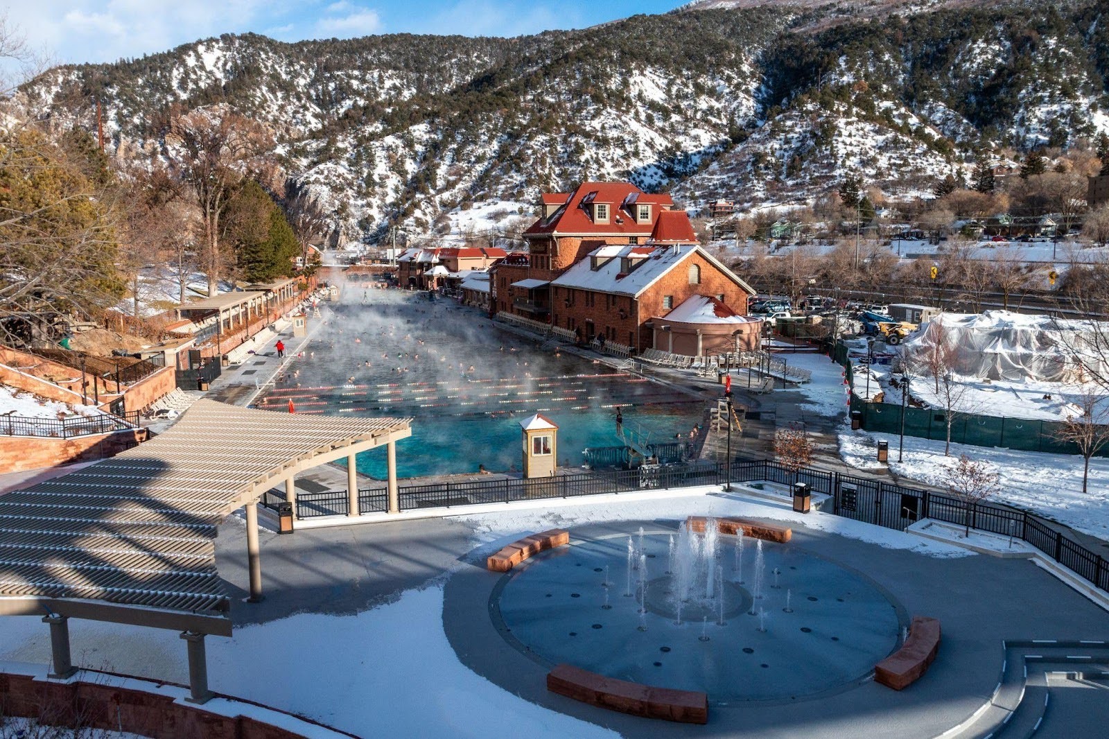 Beautiful hot springs at a Colorado copper mine showcasing vibrant colors and surrounded by rocky hills and striking nature
